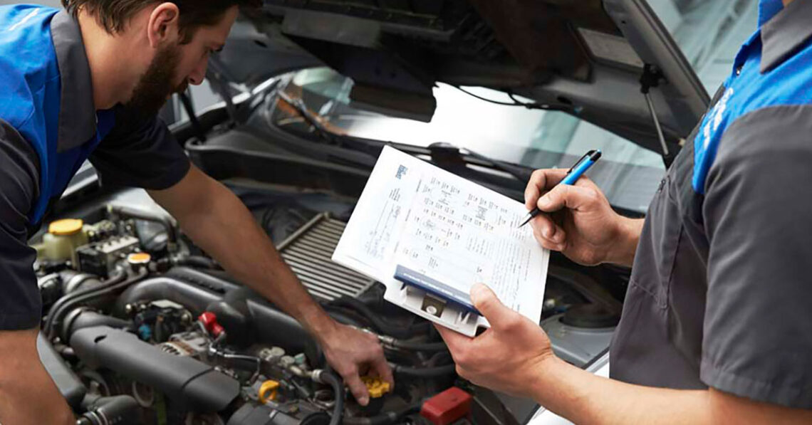 Technicians working on Subaru repair
