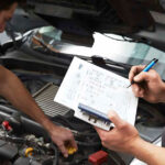 Technicians working on Subaru repair