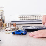 Reviewing Subaru financing options with a calculator