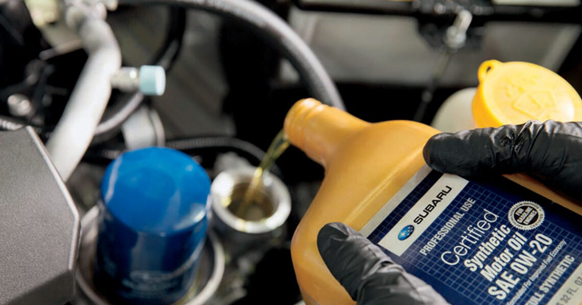 Changing oil as part of a Subaru service schedule